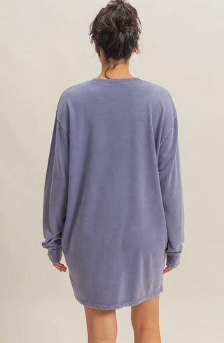 Back view of oversized dusty blue sweatshirt dress with long sleeves and relaxed fit, cozy casual fall style.